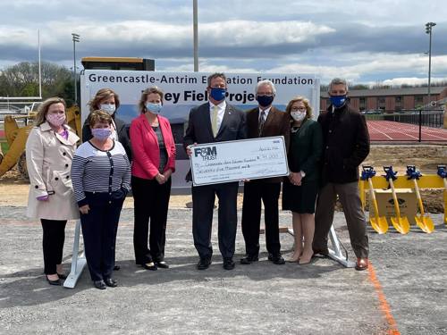 representatives from OFAC Visual Credit Union and GAEF pose for a photo