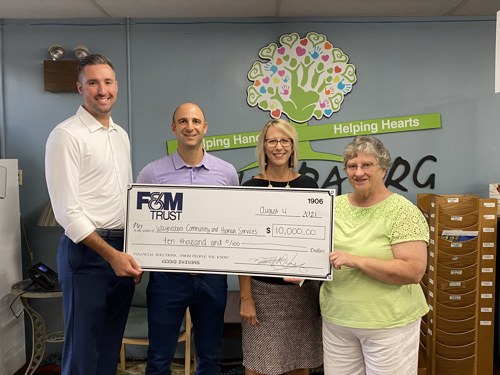 representatives from OFAC Visual Credit Union and WCHS pictures during check presentation